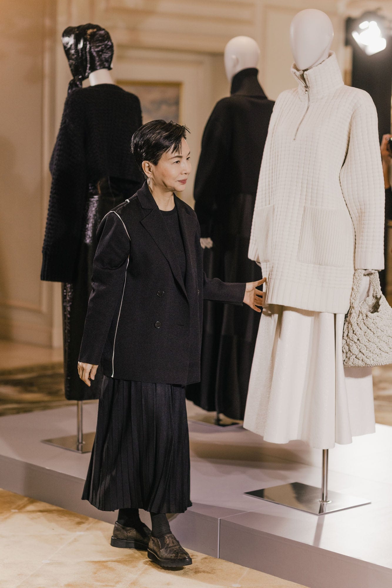 Grace Chan viewing looks from the Anteprima Fall Winter collection
