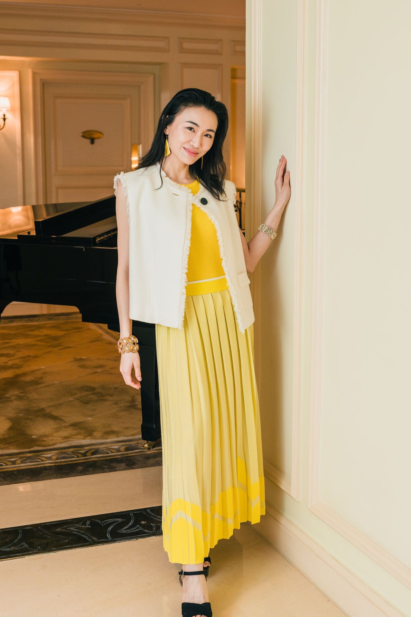 Guest in a yellow Anteprima look at the evening presentation