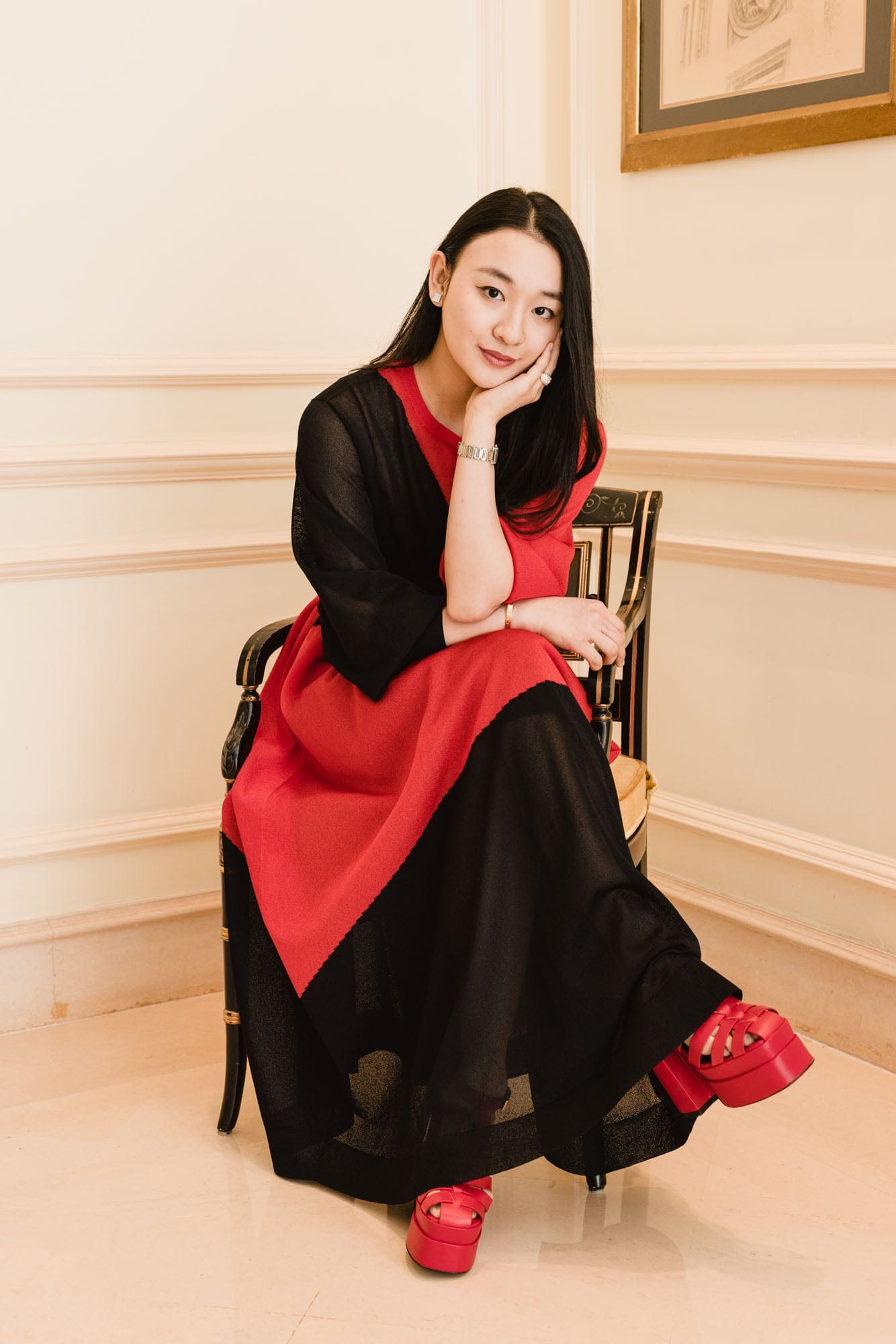 Guest in a red and black look at the Anteprima presentation