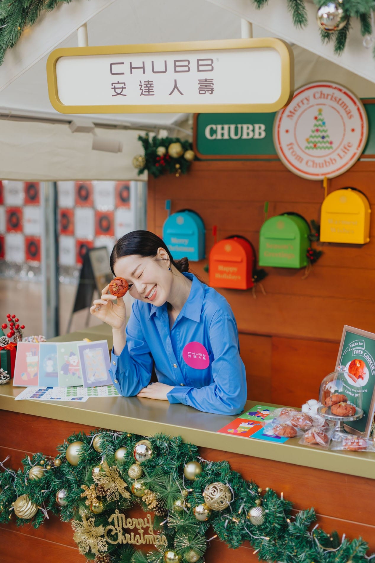 Guest enjoying a pastry at the Chubb festive market stall