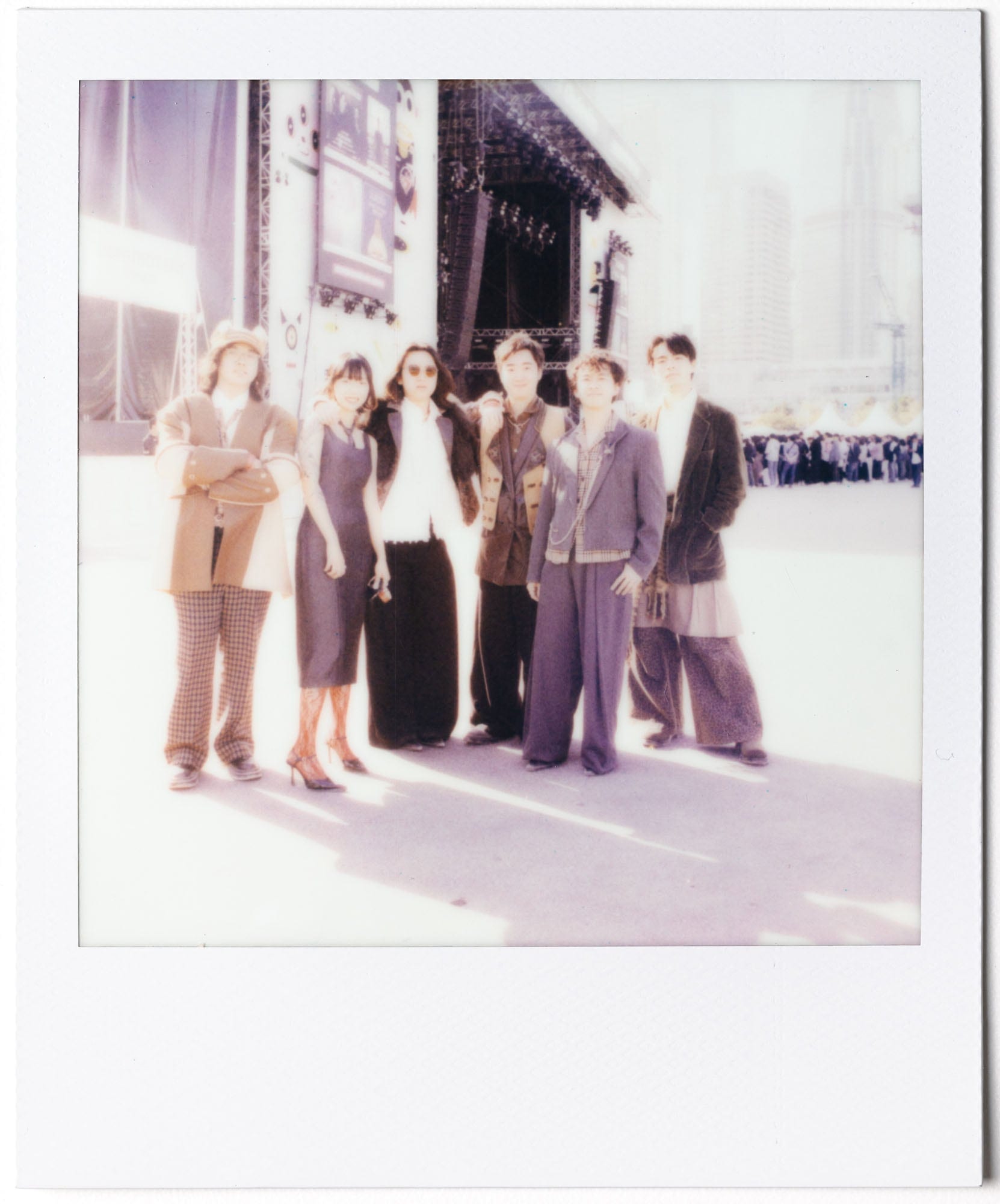 Clockenflap group portrait captured on Polaroid film