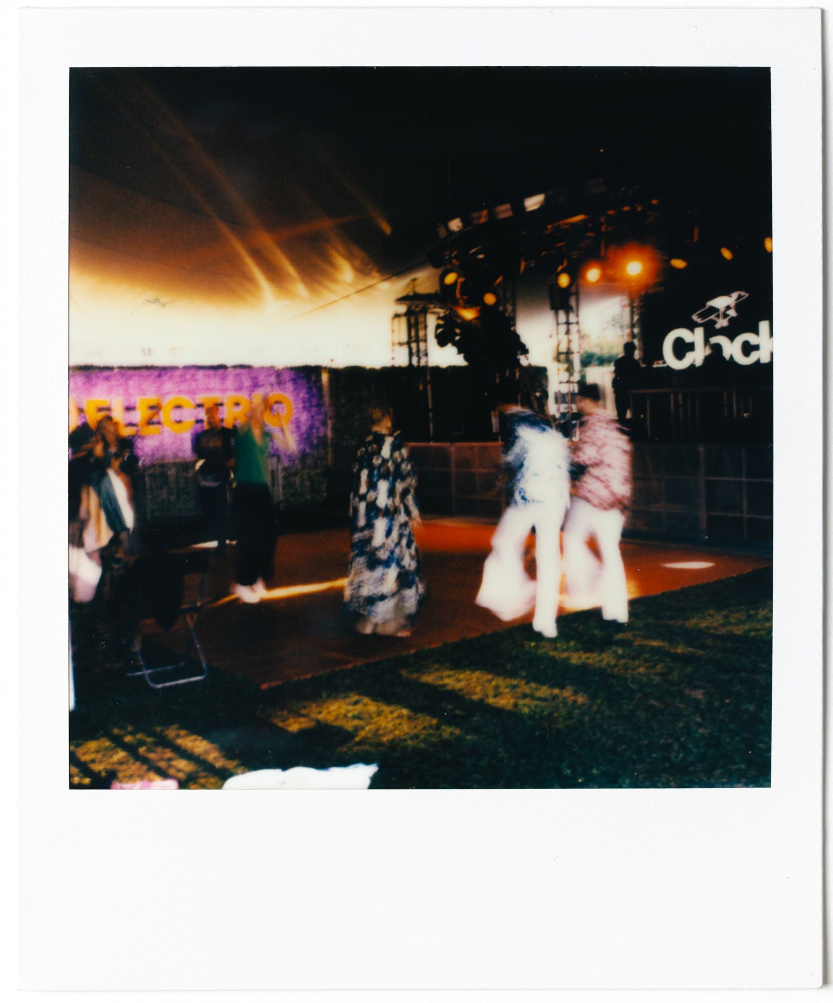 Clockenflap stage and festival atmosphere captured on Polaroid film