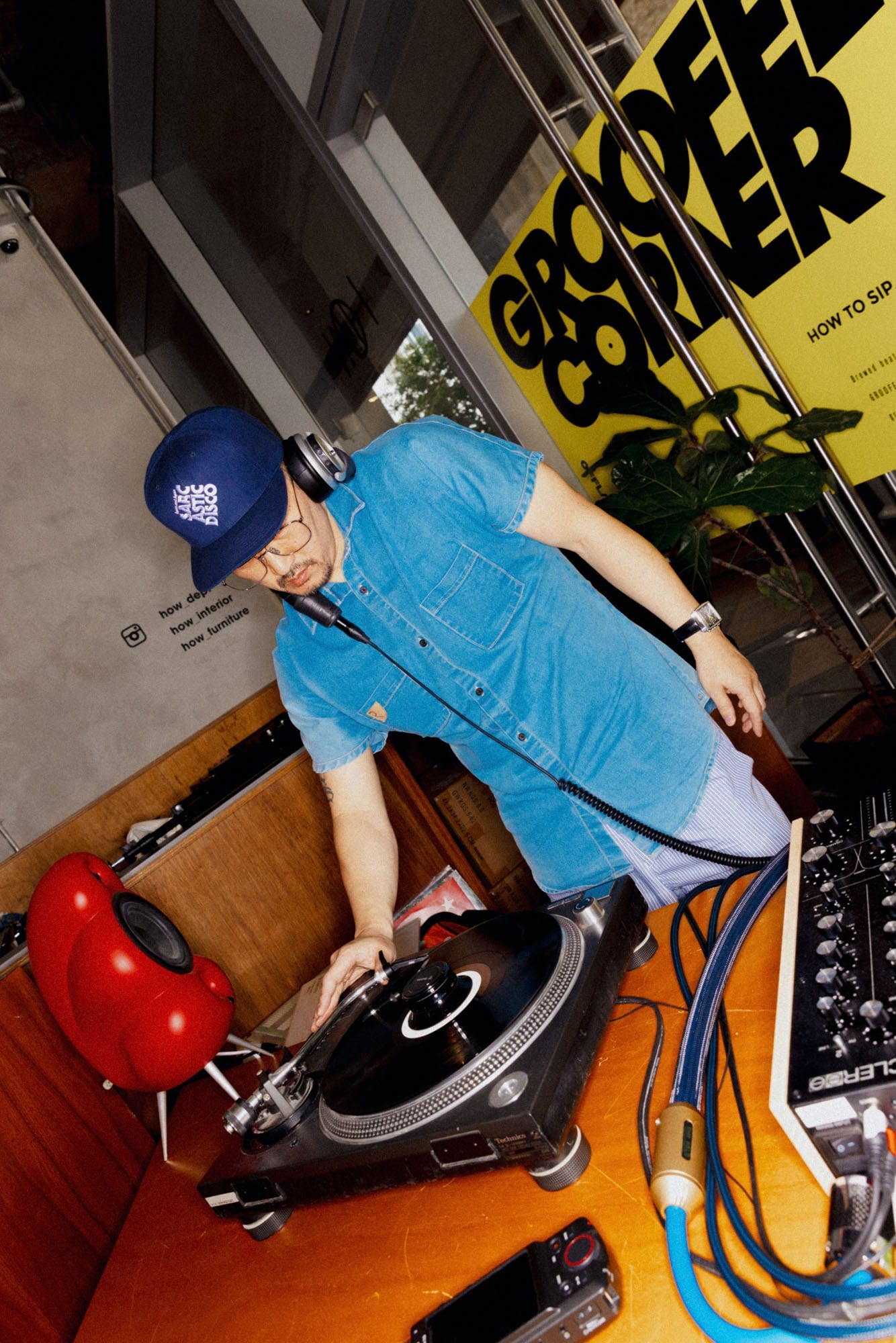 DJ performing at the Grooffee Corner event for HOW X 10000hz