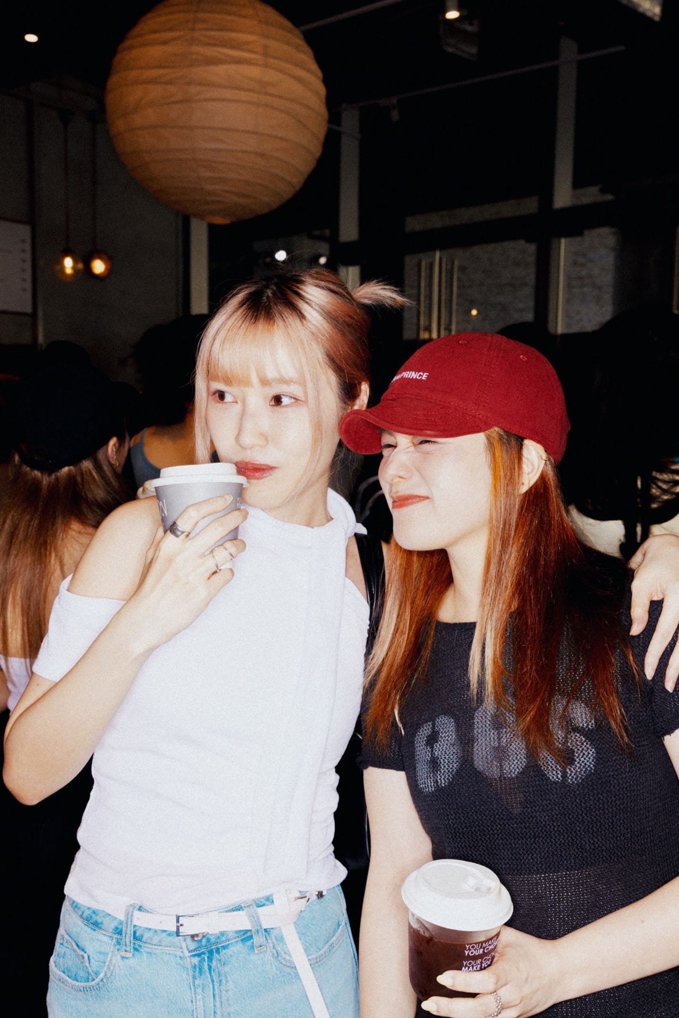 Two guests sharing coffee at Grooffee Corner
