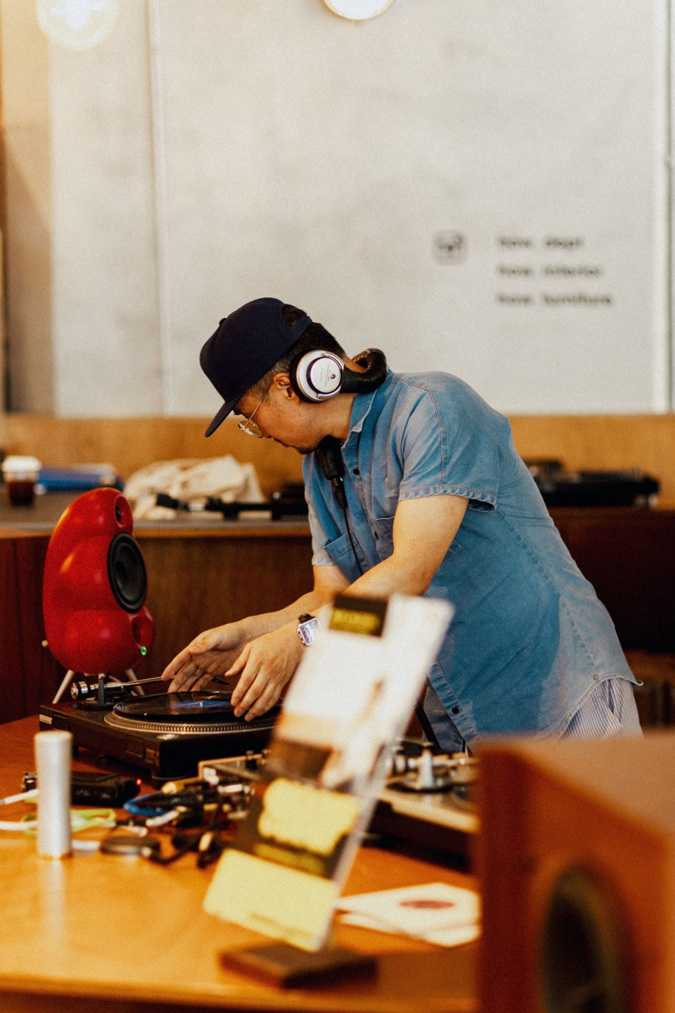 DJ working at a turntable during Grooffee Corner