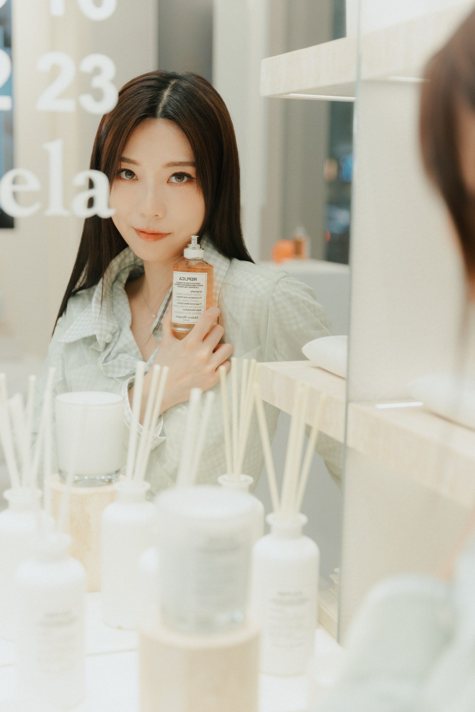 Gi holding Maison Margiela Fragrances at the Never-Ending Summer launch