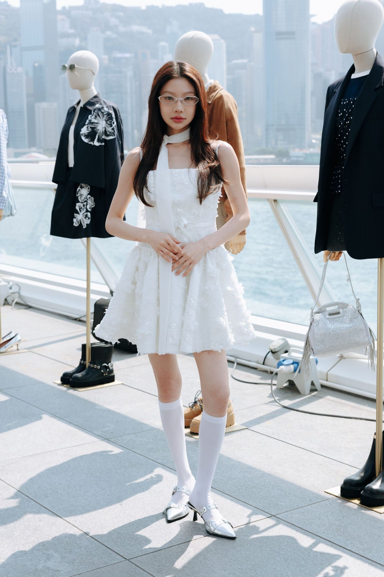 Guest in a white Maje look among the SS26 collection