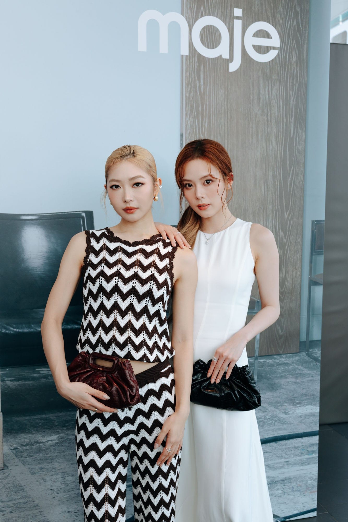 Two guests wearing Maje SS26 looks