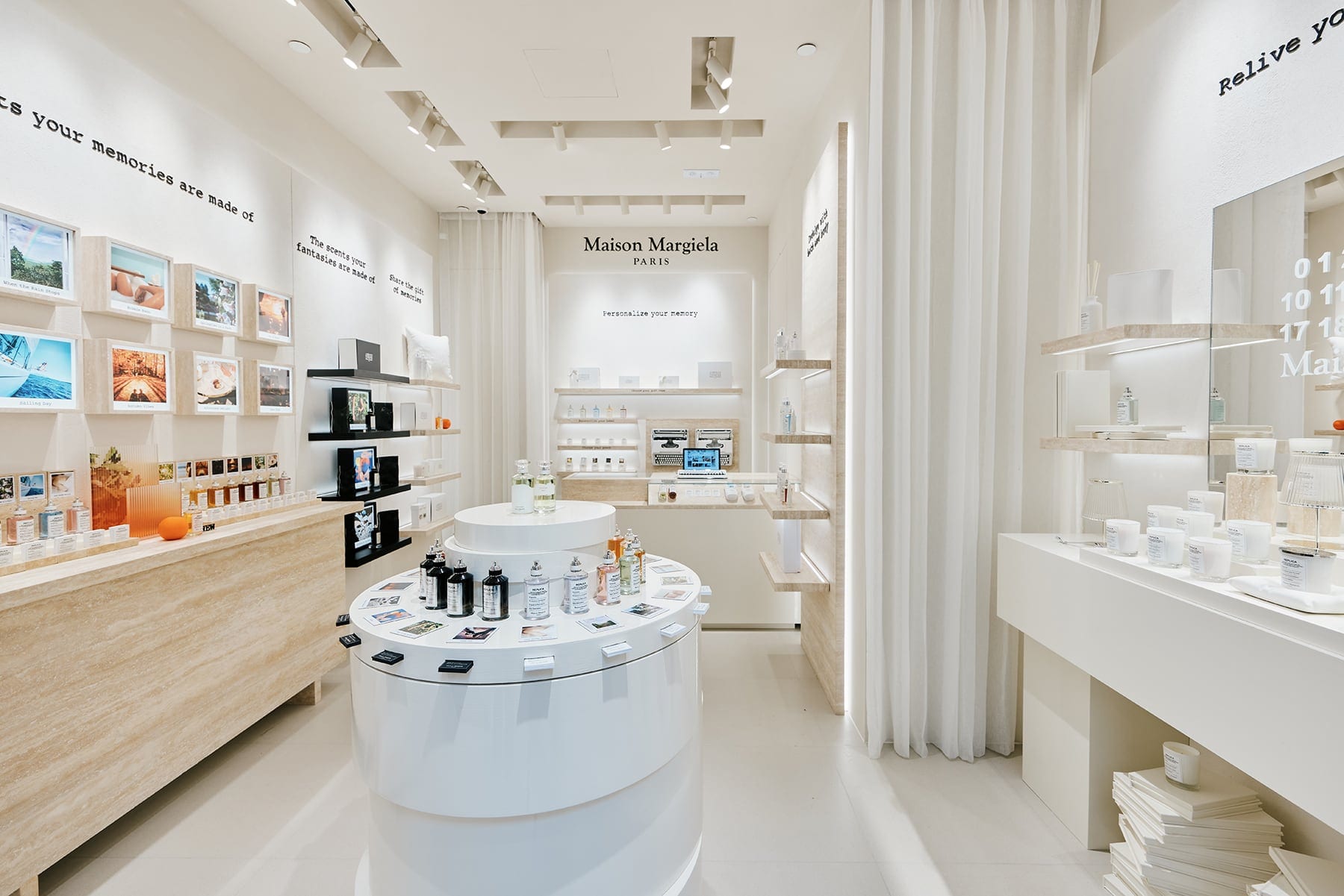 Maison Margiela retail interior with shelves, products and soft white light