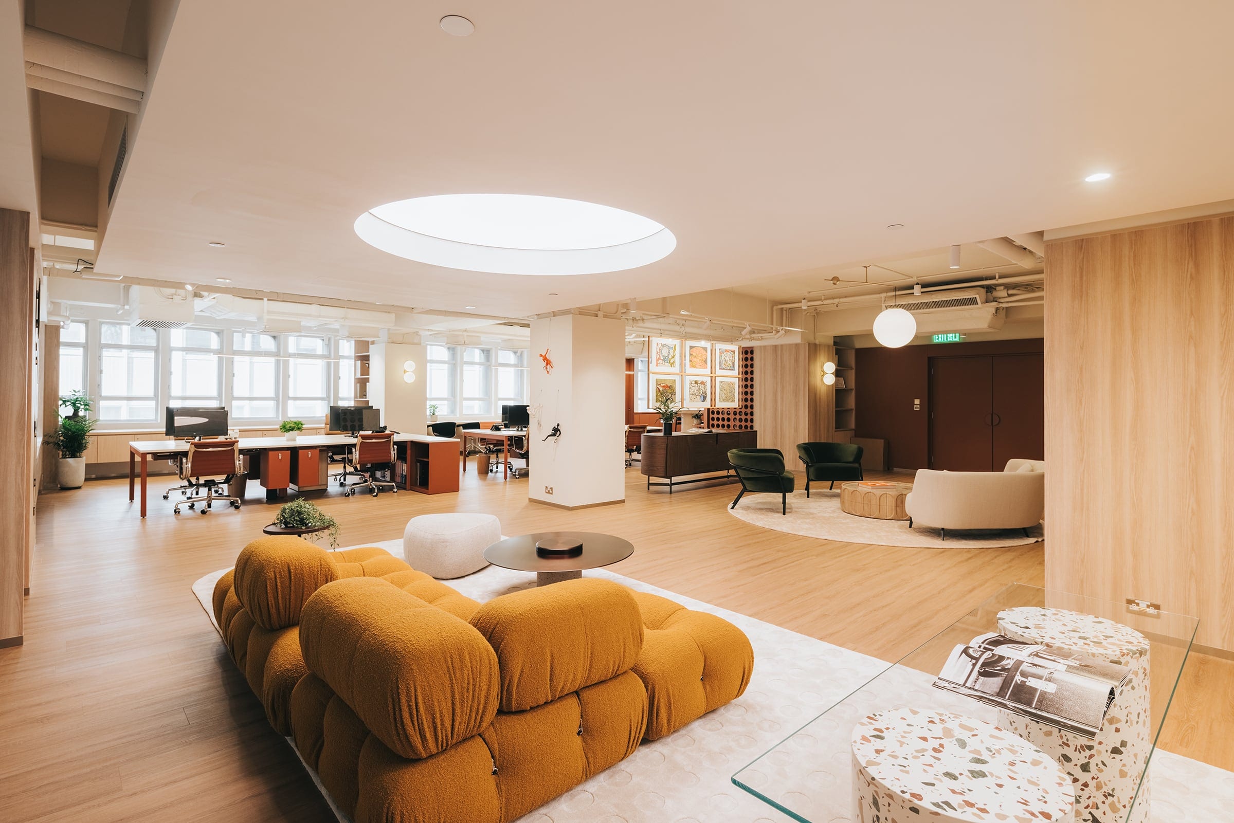 TCBB Office interior with warm timber, workspaces and lounge seating
