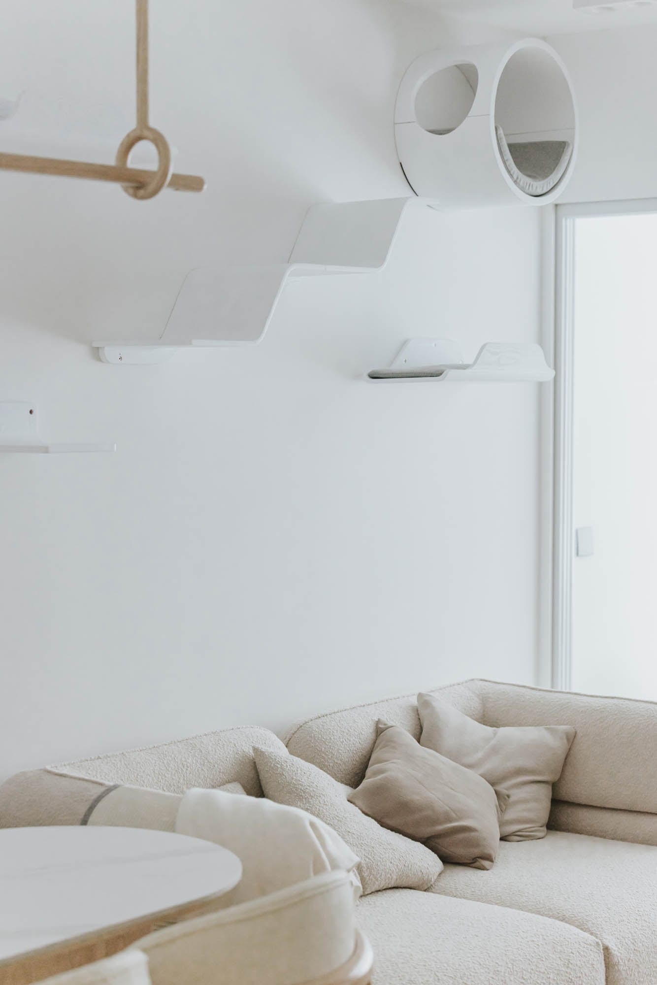 Kai Chuen Court living room cat wall and textured sofa detail