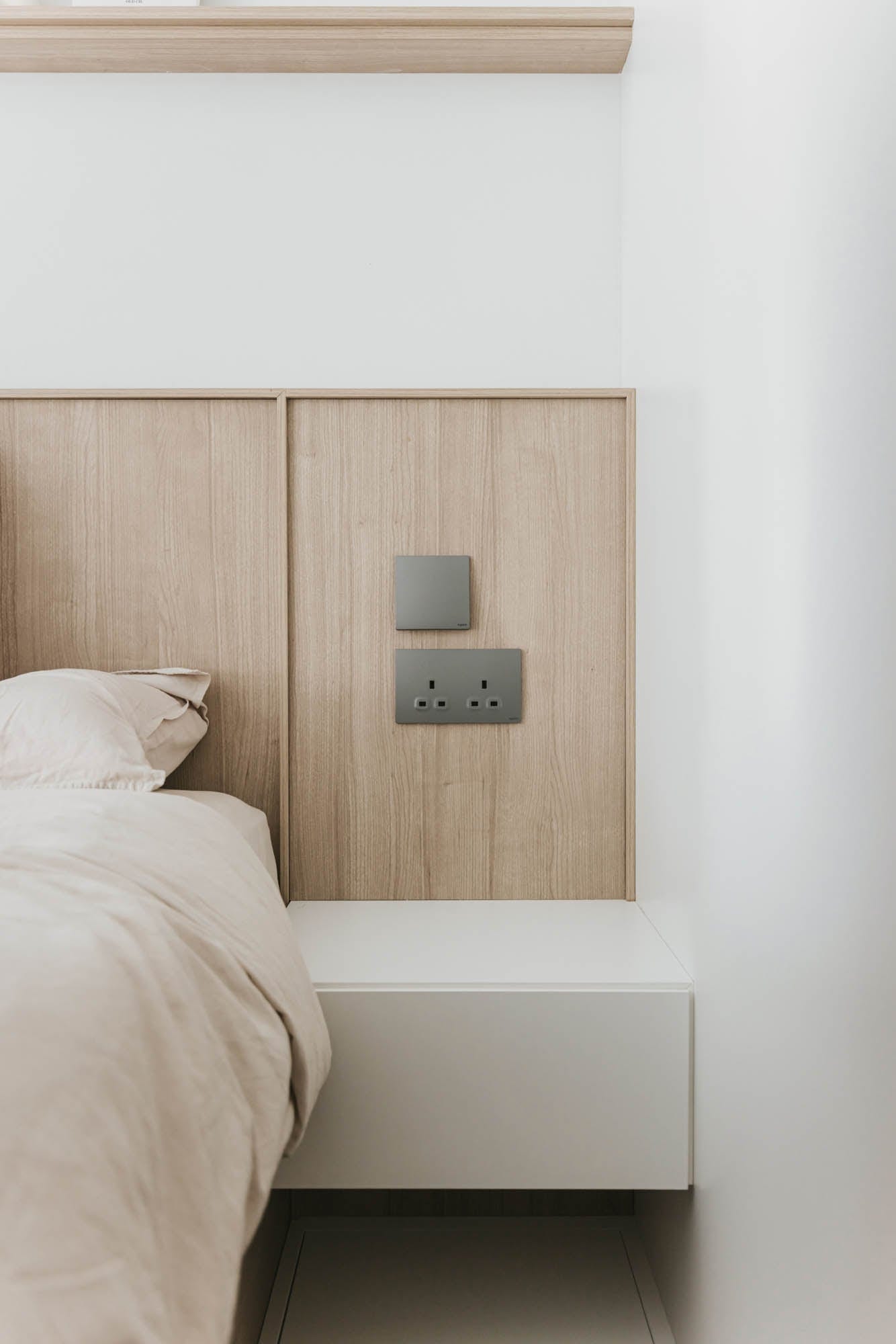 Kai Chuen Court bedside joinery and socket detail