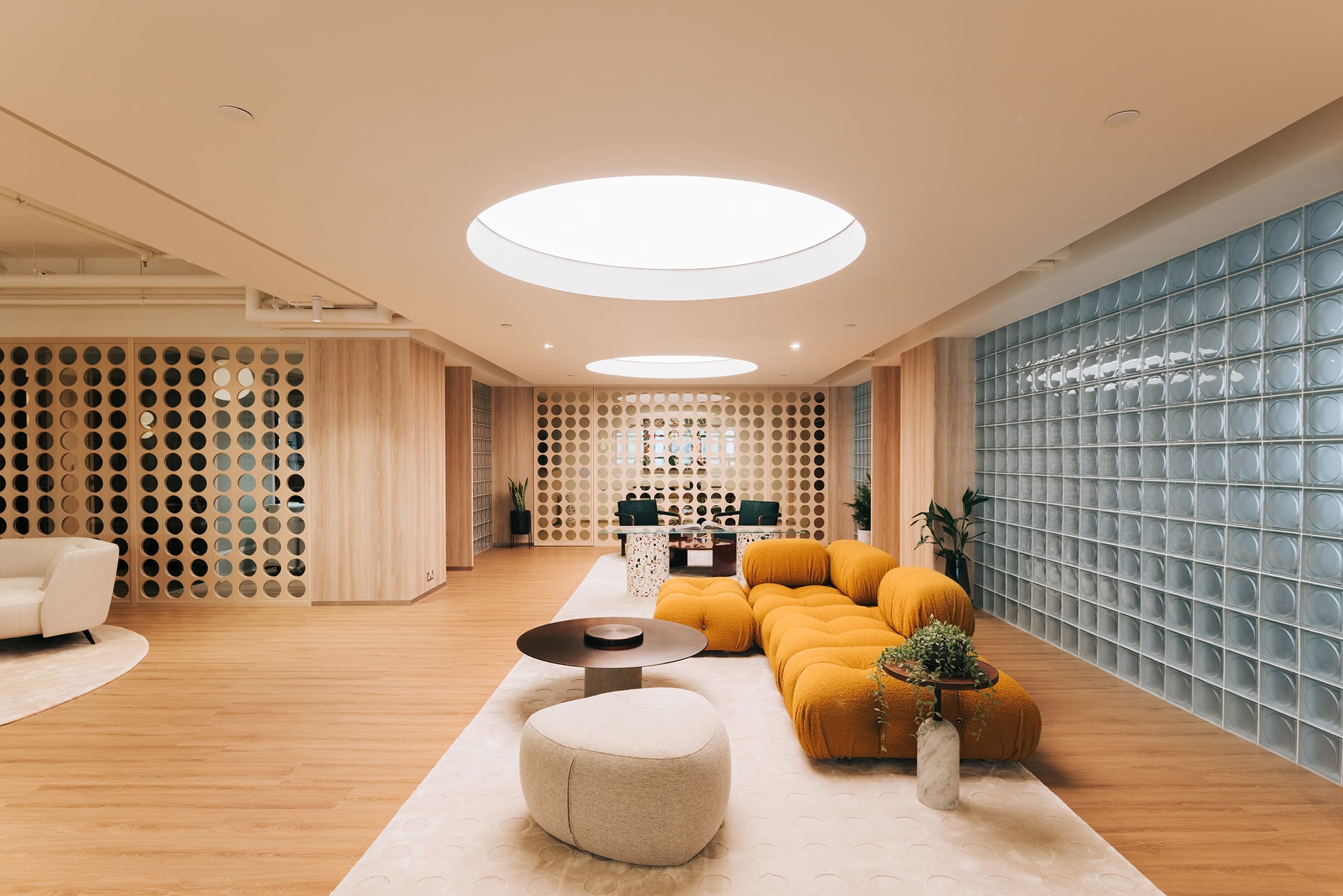 TCBB Office lounge and meeting area in warm natural light
